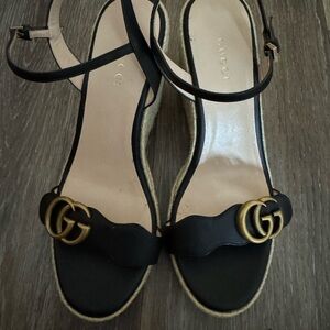 Gucci Black Sandals with Gold Accents